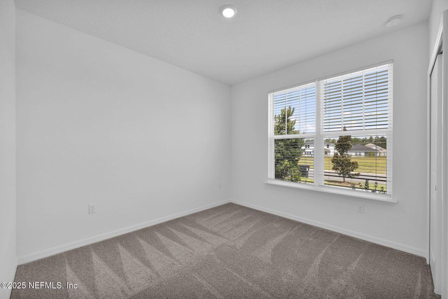 Spacious, unfurnished interior of a new home in Hyland Trail, Green Cove Springs (Image 11).