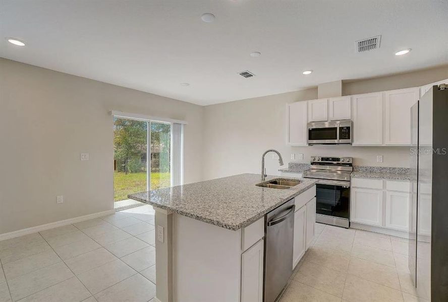 Furnished interior view inside a new home in Royal Highlands, Weeki Wachee (Image 9).