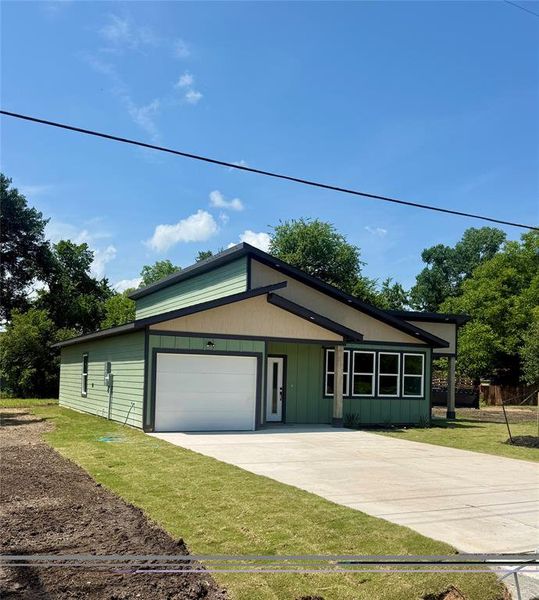Front exterior of a new home in , Cooper, TX, highlighting curb appeal (Image 17).