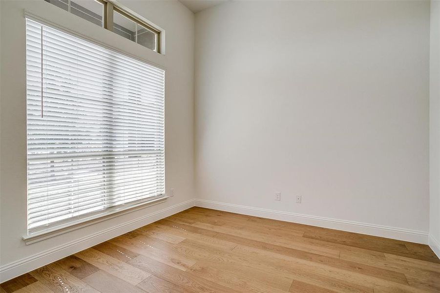 Unfurnished room featuring light hardwood / wood-style floors