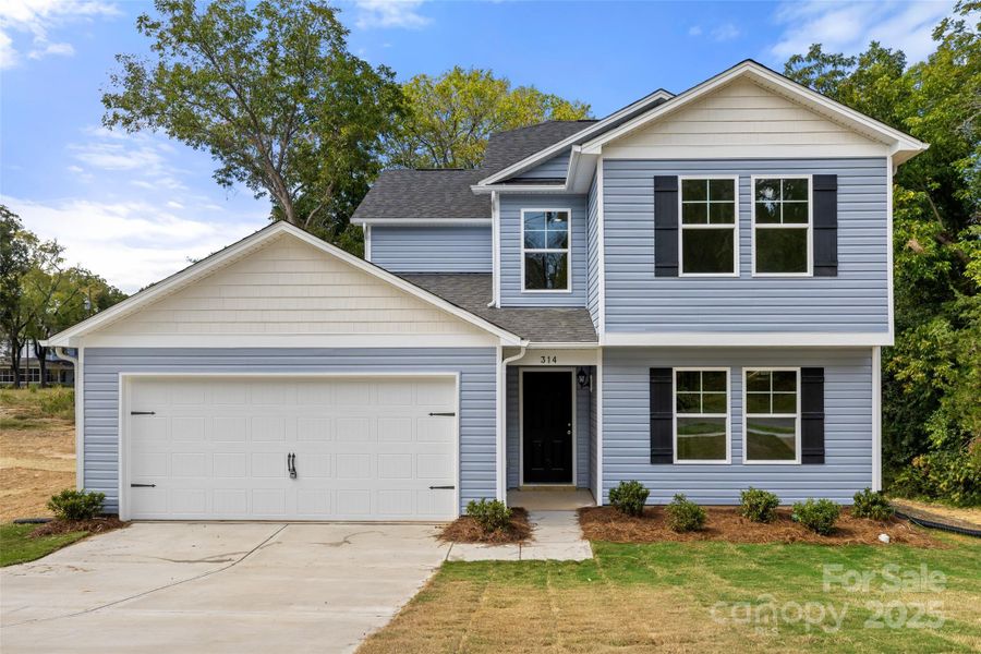 Front exterior of a new home in , Lancaster, SC, highlighting curb appeal (Image 1).