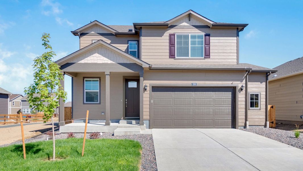 Representative exterior photo of a completed home built from the Sienna by D.R. Horton in Westgate, Greeley, CO (Image 5).