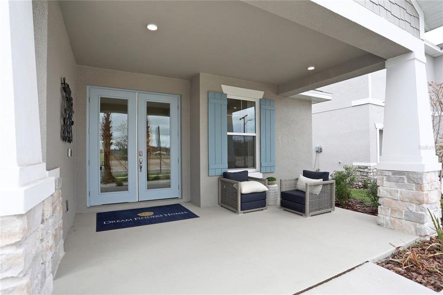 Exterior details and patio area of a home in Angeline, Land O' Lakes (Image 21).