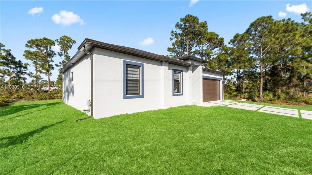 Exterior details and patio area of a home in , Lehigh Acres (Image 27). Exterior details and patio area of a home in , Lehigh Acres (Image 27).