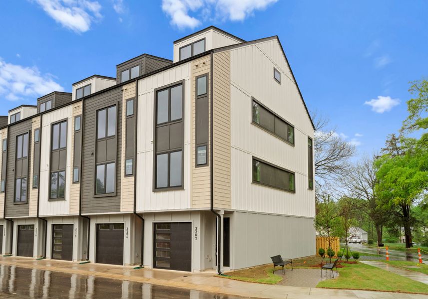 Front exterior of a new home in Hartford Townhomes, Charlotte, NC, highlighting curb appeal (Image 9).