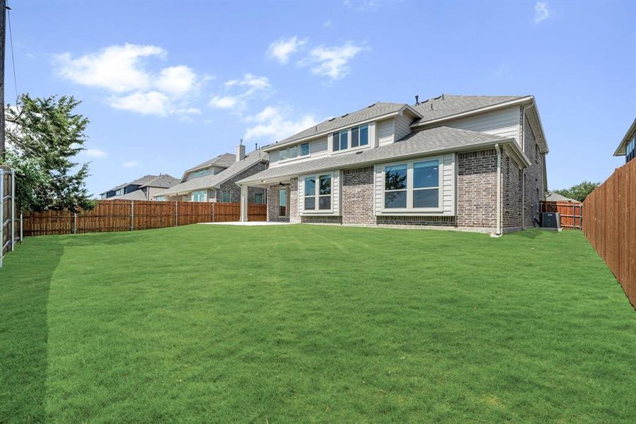 Front exterior of a new home in Mockingbird Heights Classic 60, Midlothian, TX, highlighting curb appeal (Image 24). Front exterior of a new home in Mockingbird Heights Classic 60, Midlothian, TX, highlighting curb appeal (Image 24).
