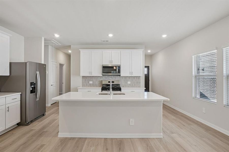 Photo is not of the actual home, but is an inspirational photo of builder’s model home and may depict options, furnishings, and/or decorator features that are not included.