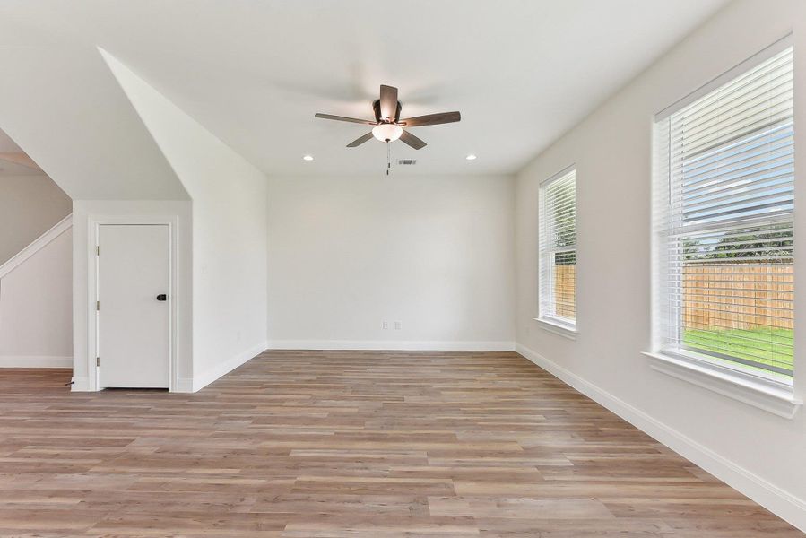 Living Area with light wood-look flooring,