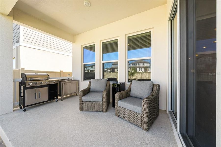 Exterior details and patio area of a home in Silverleaf Reserve, Winter Garden (Image 21).