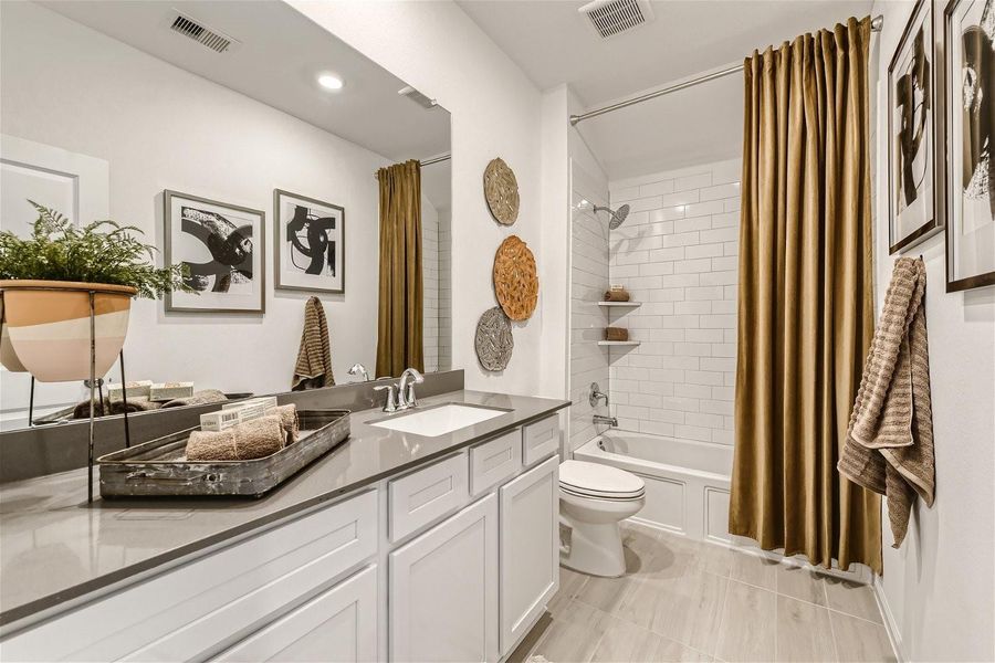 Furnished interior view inside a new home in Bridgeland, Cypress (Image 9).