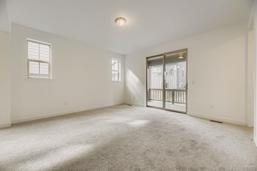 Spacious, unfurnished interior of a new home in Red Rocks Ranch: The Grand Collection, Morrison (Image 13).