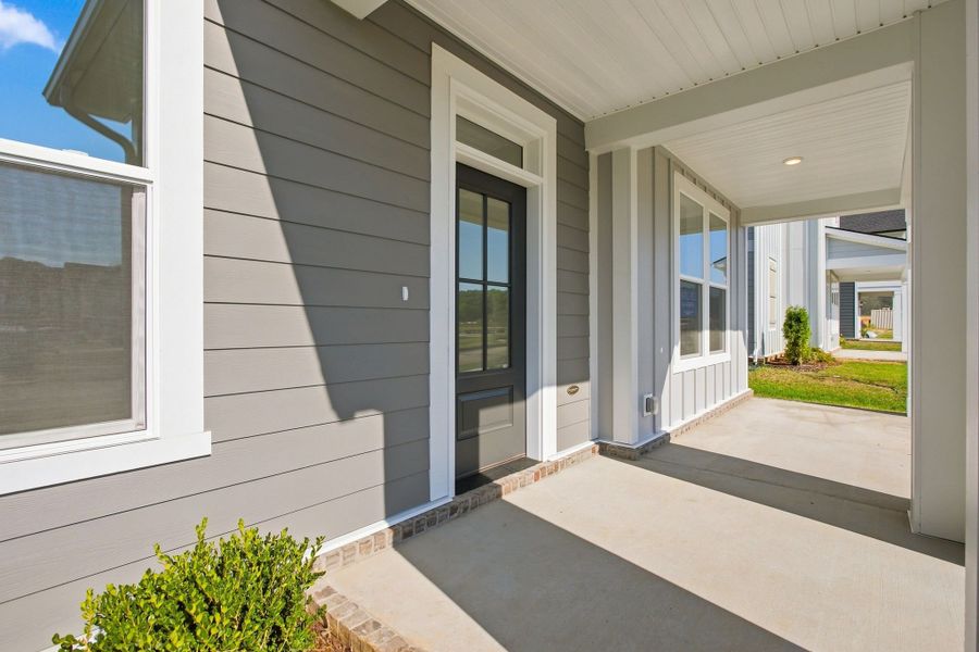 Exterior details and patio area of a home in Heritage Green – The Porch Collection, Columbia (Image 3).