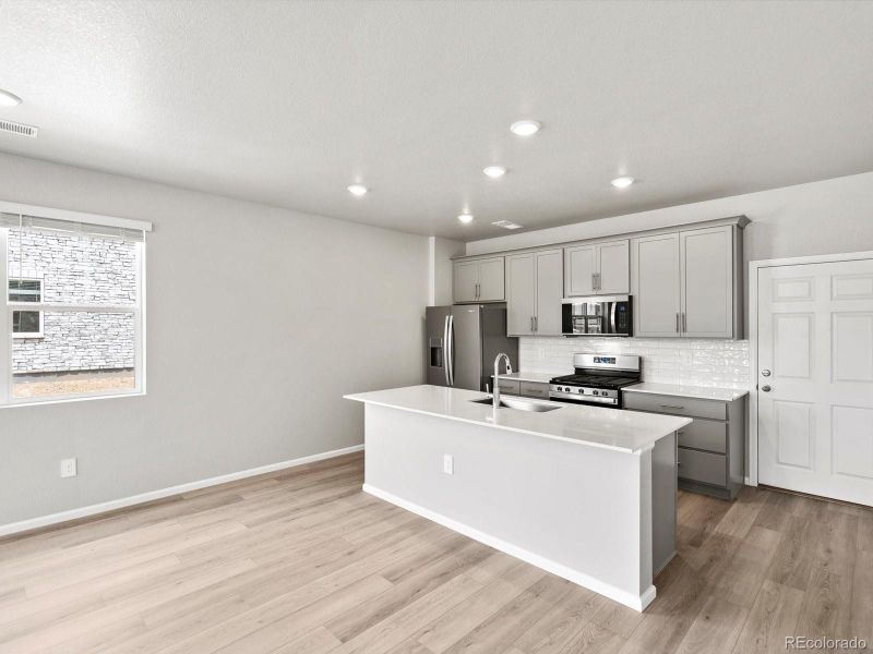 Furnished interior view inside a new home in Horizon Uptown: The Meadow Collection, Aurora (Image 3). Furnished interior view inside a new home in Horizon Uptown: The Meadow Collection, Aurora (Image 3).