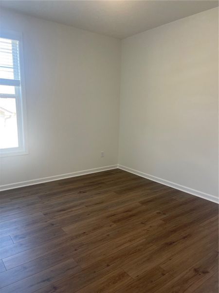 Spacious, unfurnished interior of a new home in Springwood Grove, Central (Image 29).