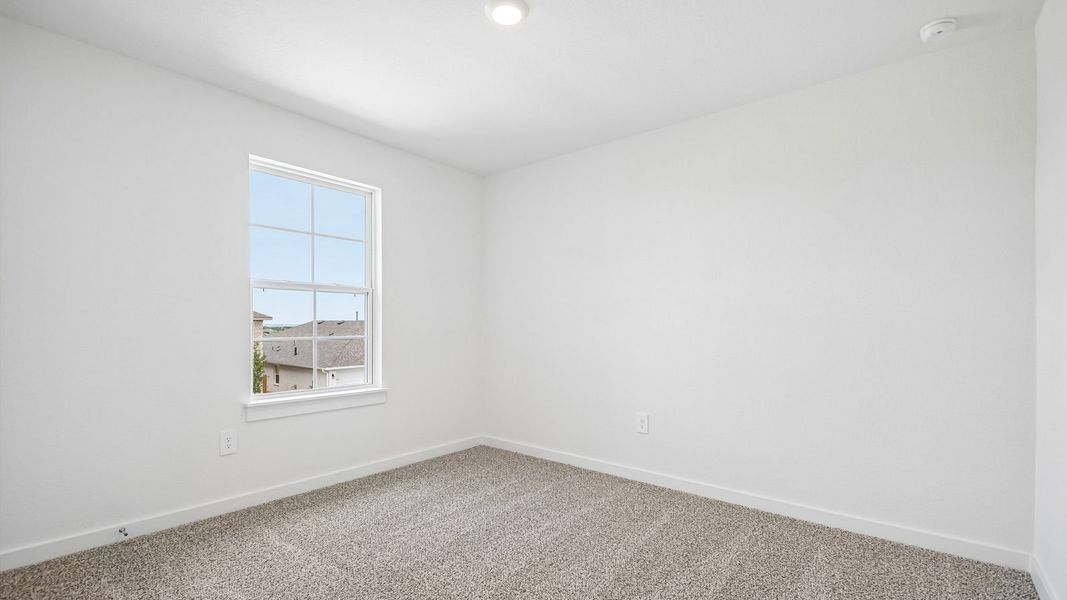 Spacious, unfurnished interior of a new home in Rosenbusch Ranch, Leander (Image 29).