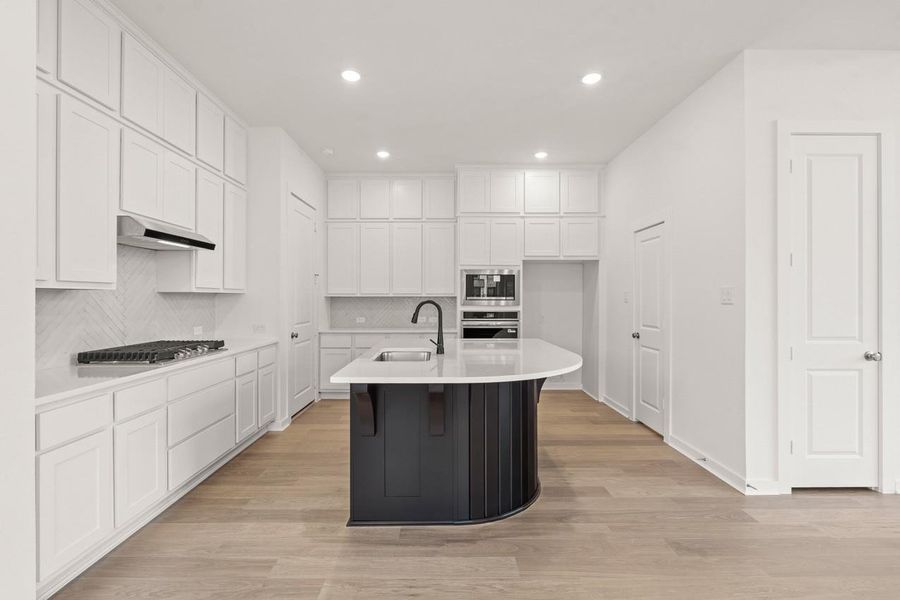 Furnished interior view inside a new home in Bridgeland, Cypress (Image 8).