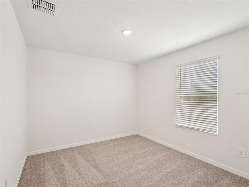 Spacious, unfurnished interior of a new home in Coasterra - Premier Series, Palmetto (Image 25).