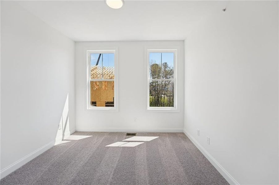 Spacious, unfurnished interior of a new home in Market Square at Sawnee Village, Cumming (Image 30).