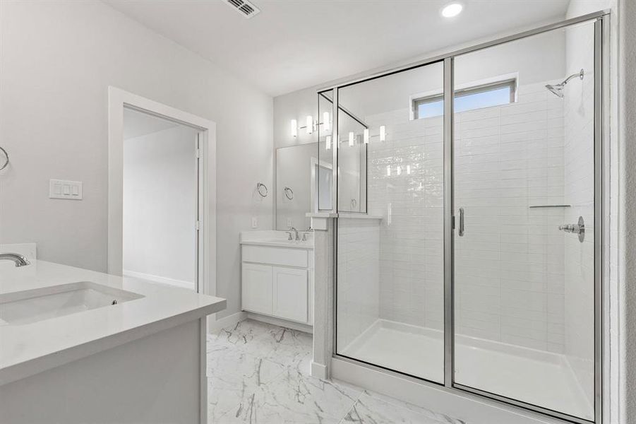 Primary Bathroom in the Winters home plan by Trophy Signature Homes – REPRESENTATIVE PHOTO Primary Bathroom in the Winters home plan by Trophy Signature Homes – REPRESENTATIVE PHOTO