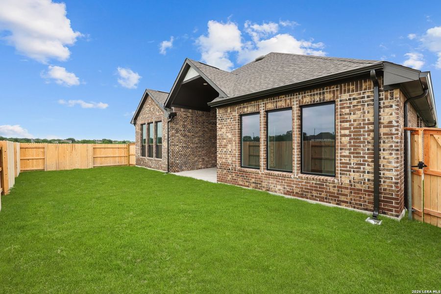 Exterior details and patio area of a home in Buffalo Crossing, Cibolo (Image 29).