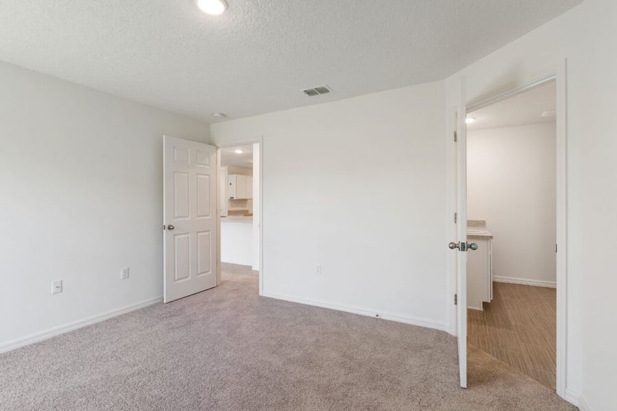 Representative unfurnished interior of a home built from the Foxtail by Holiday Builders in Port St Lucie, Port St. Lucie (Image 9).