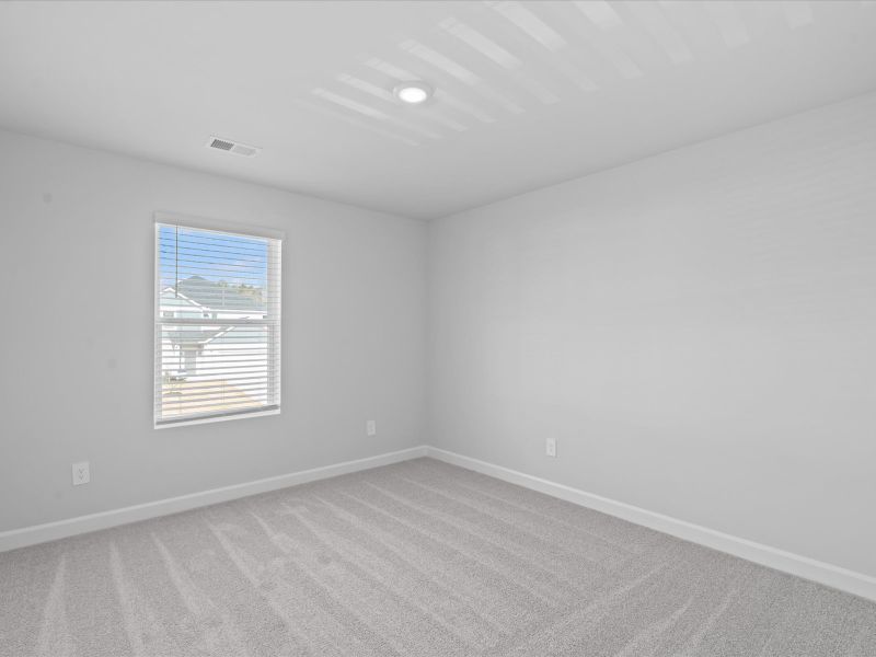 Spacious, unfurnished interior of a new home in The Farm at Wells Creek - Signature Collection, Gray Court (Image 18).