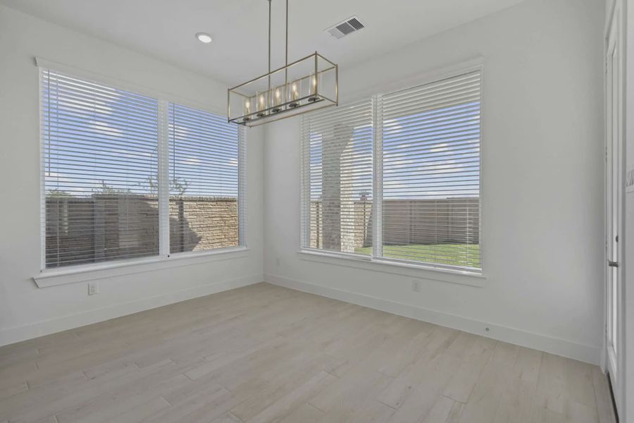 Representative unfurnished interior of a home built from the Waterford by Chesmar Homes in Meridiana 60's, Manvel (Image 24).