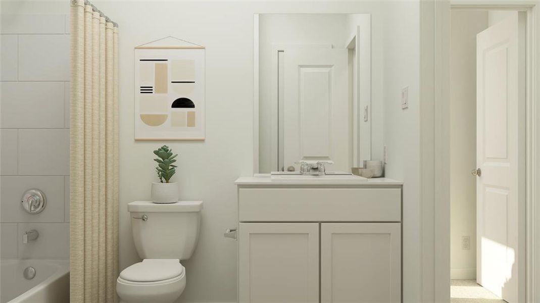 Full bathroom featuring vanity, toilet, and shower / tub combo with curtain