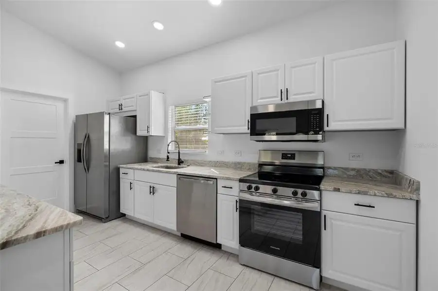 Furnished interior view inside a new home in , Punta Gorda (Image 4).