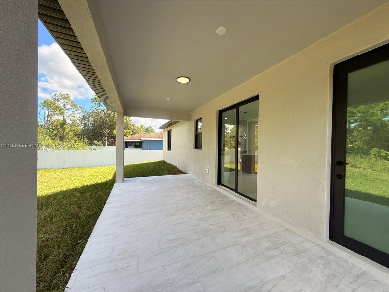 Exterior details and patio area of a home in , Lehigh Acres (Image 28).