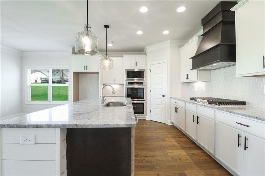 Furnished interior view inside a new home in Calgary Downs, Winder (Image 5).