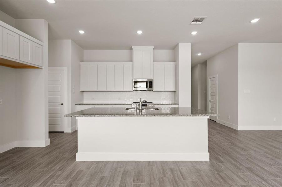 Furnished interior view inside a new home in Saddleback Estates, Boyd (Image 10). Furnished interior view inside a new home in Saddleback Estates, Boyd (Image 10).