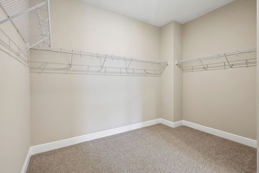 Spacious, unfurnished interior of a new home in Legends Preserve - Signature Series, Daytona Beach (Image 15).