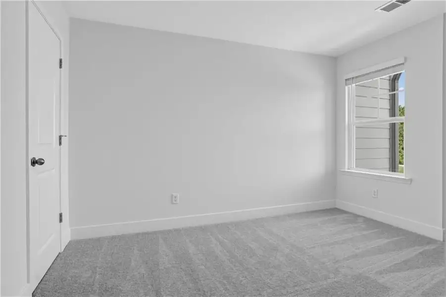 Spacious, unfurnished interior of a new home in Towns at Holly Springs, Holly Springs (Image 23). Spacious, unfurnished interior of a new home in Towns at Holly Springs, Holly Springs (Image 23).