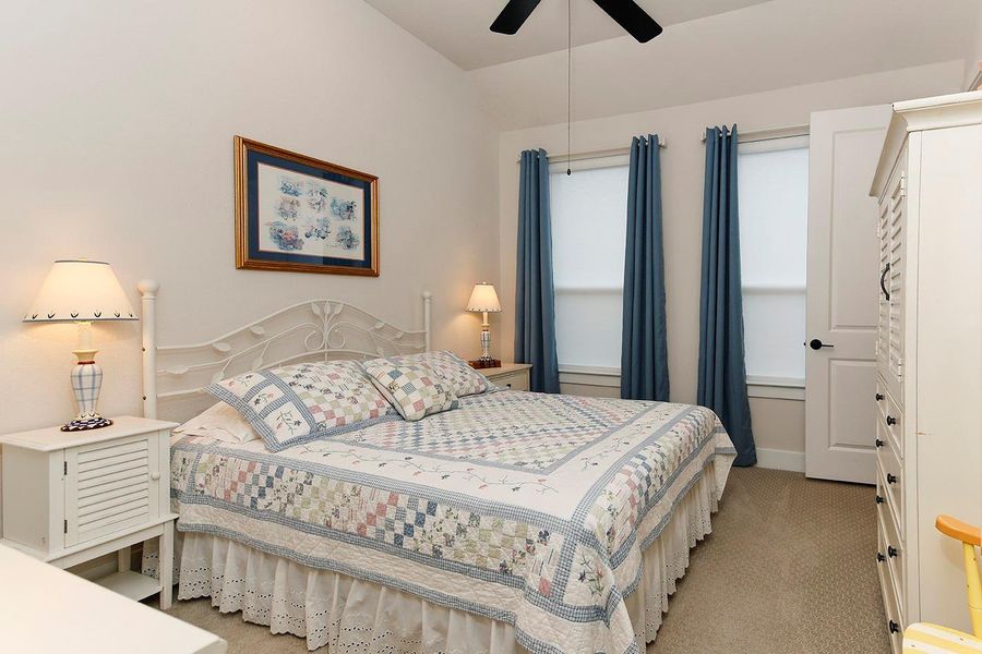 Secondary bedrm w two windows, ceiling fan, spacious closet Secondary bedrm w two windows, ceiling fan, spacious closet