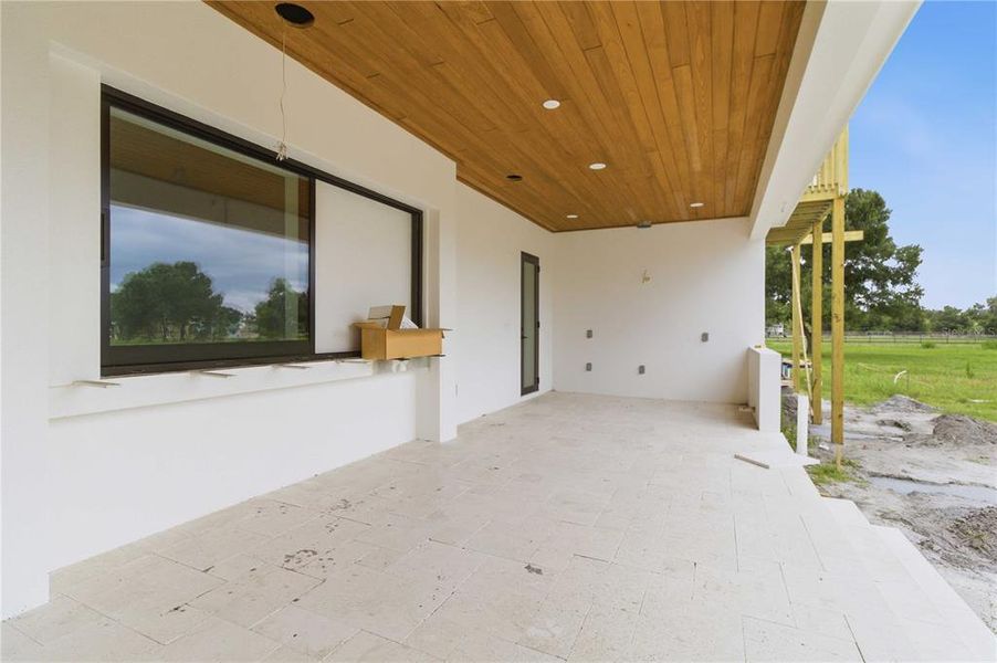 Exterior details and patio area of a home in , Sarasota (Image 13).