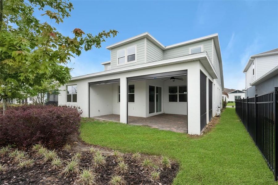 Exterior details and patio area of a home in Willow Ridge, Montverde (Image 24).