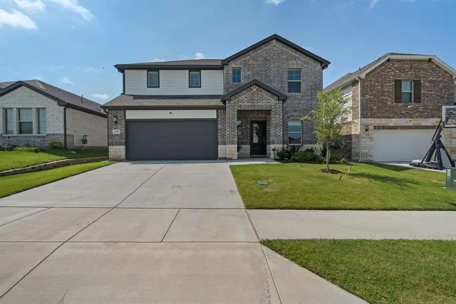 Front exterior of a new home in , Fort Worth, TX, highlighting curb appeal (Image 2). Front exterior of a new home in , Fort Worth, TX, highlighting curb appeal (Image 2).