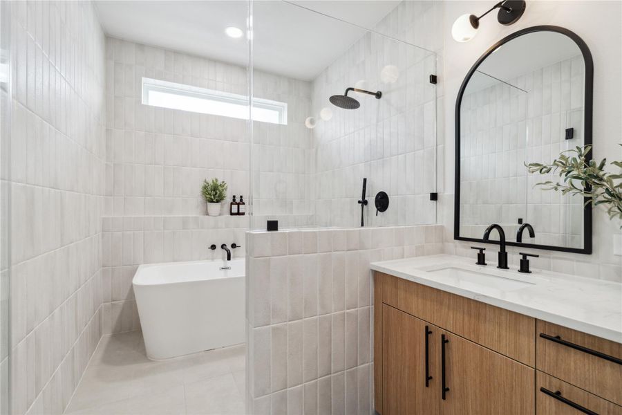 Seamless transitions and soft contrast make this ensuite feel elevated yet quietly grounded—true to Delafield’s design DNA.