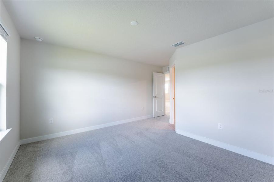Spacious, unfurnished interior of a new home in The Palms at Venetian Bay, New Smyrna Beach (Image 19). Spacious, unfurnished interior of a new home in The Palms at Venetian Bay, New Smyrna Beach (Image 19).