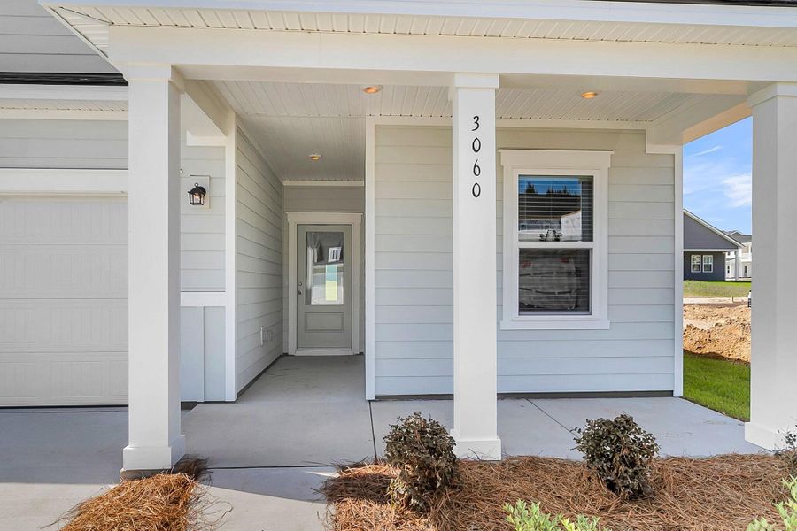 Exterior details and patio area of a home in Tea Farm, Ravenel (Image 20).