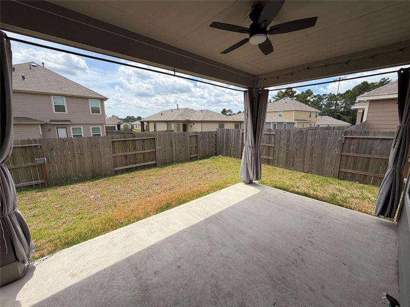 Exterior details and patio area of a home in , Magnolia (Image 3). Exterior details and patio area of a home in , Magnolia (Image 3).