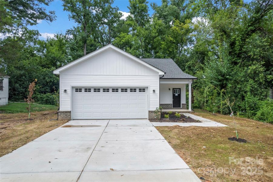 Front exterior of a new home in , Rock Hill, SC, highlighting curb appeal (Image 20).