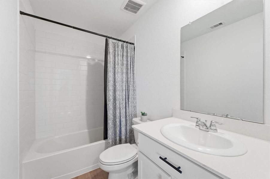 Furnished interior view inside a new home in Pinewood at Grand Texas, New Caney (Image 11).