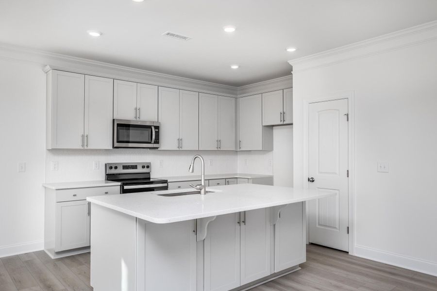 Furnished interior view inside a new home in 1158 Place, Wilson (Image 9).