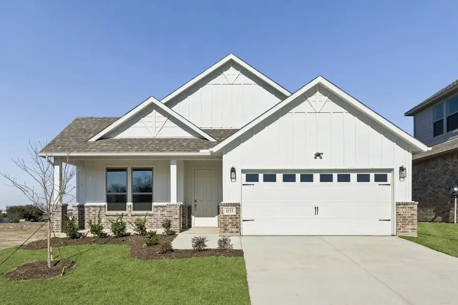 Representative exterior photo of a completed home built from the The Elm by Lillian Custom Homes in Hickory Hill, Sherman, TX (Image 22).