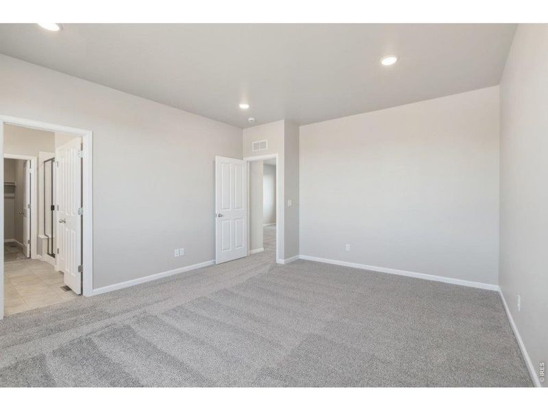Spacious, unfurnished interior of a new home in Highlands Preserve, Mead (Image 18).