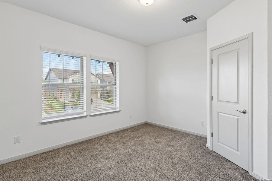 Spacious, unfurnished interior of a new home in Magnolia Village North, San Antonio (Image 29).