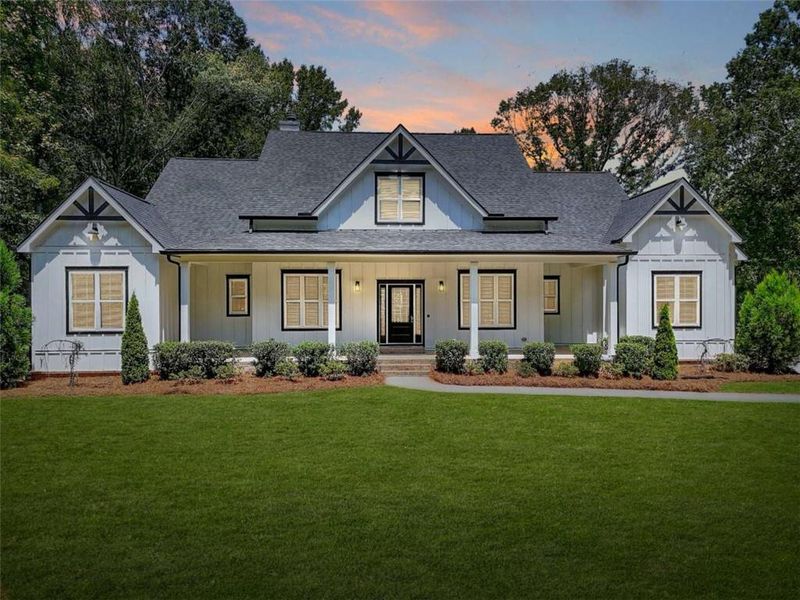 Front exterior of a new home in , Monroe, GA, highlighting curb appeal (Image 1). Front exterior of a new home in , Monroe, GA, highlighting curb appeal (Image 1).