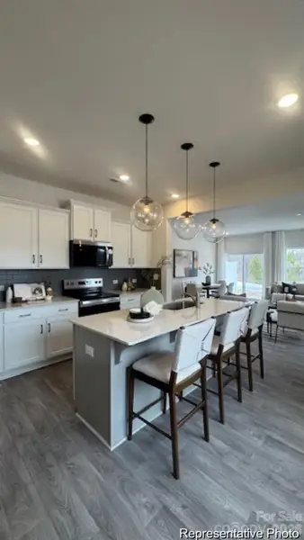 Furnished interior view inside a new home in Clark Village Townhomes, Charlotte (Image 4).